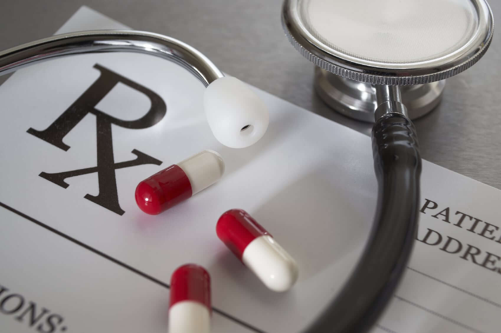 Close-up of RX  prescription and stethoscope